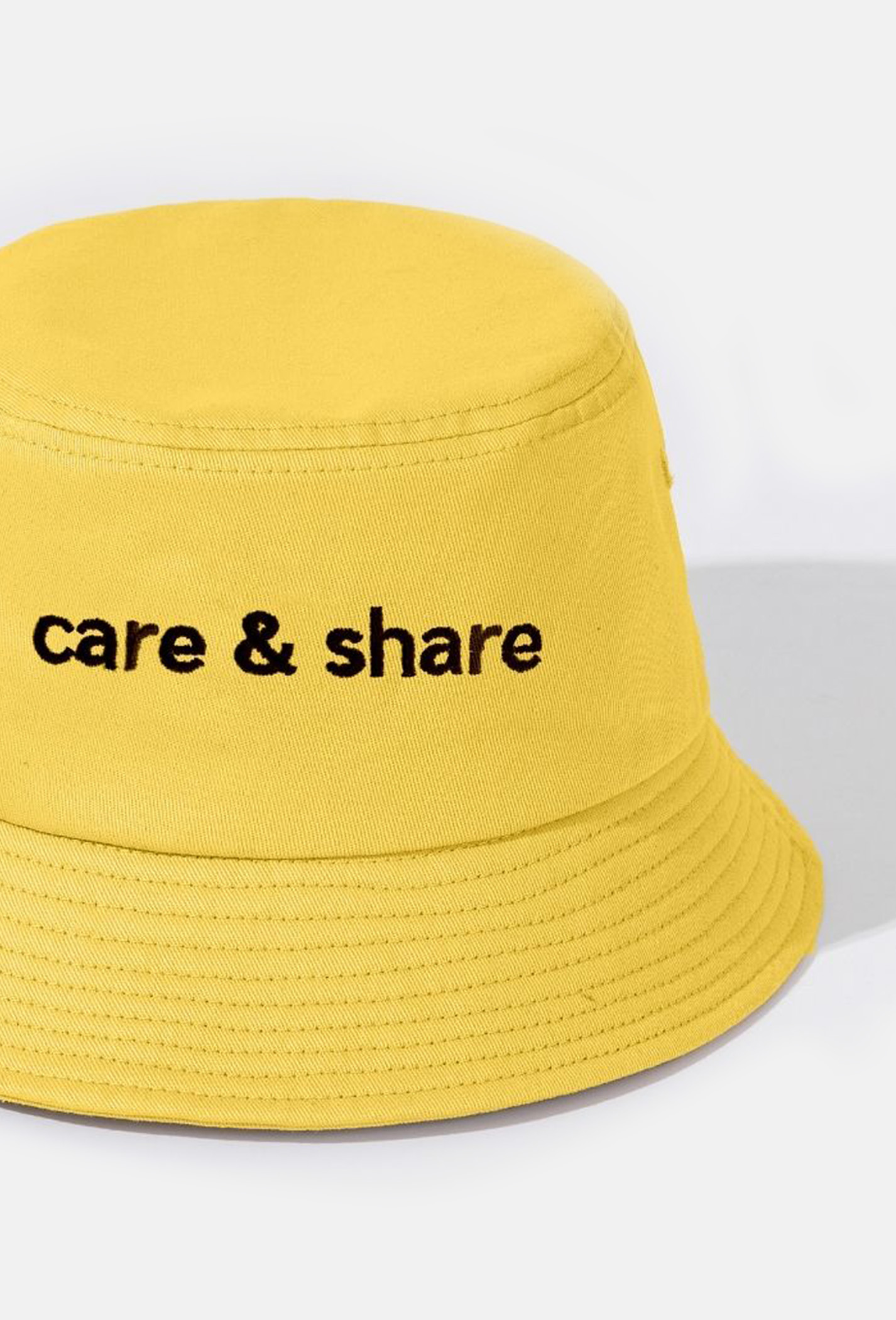 Mũ/Nón Bucket Hat thêu Care & Share Typo Vàng 3
